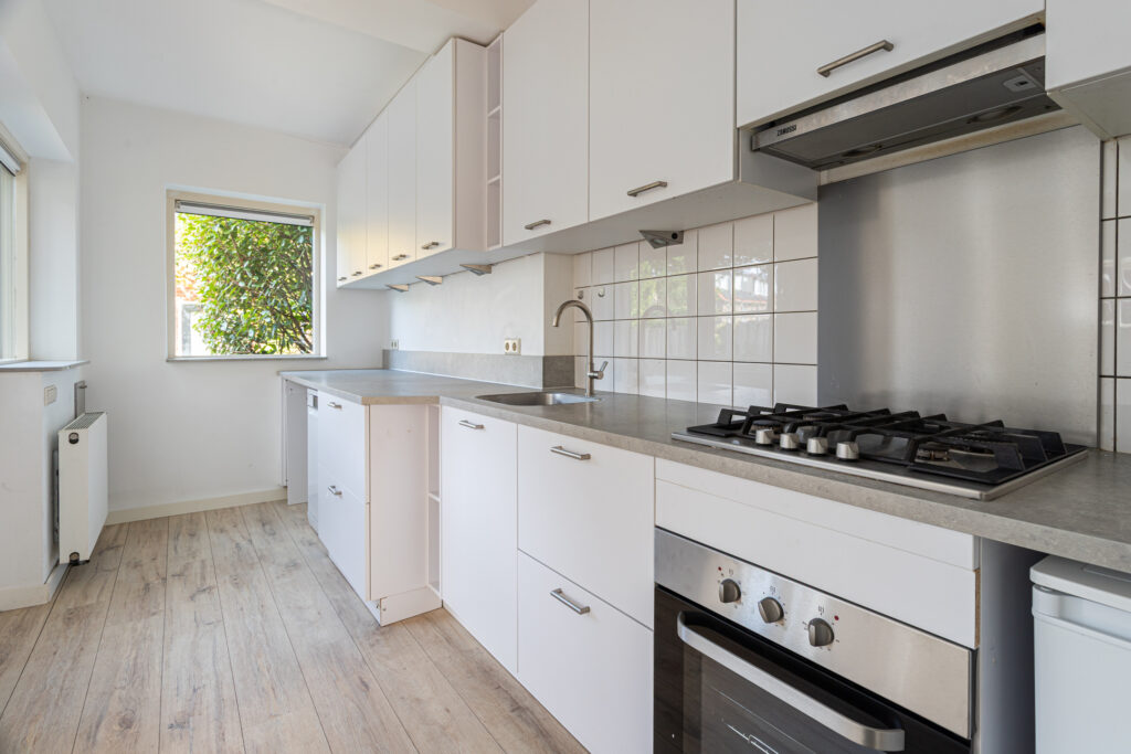 Modern kitchen with stove and cabinets