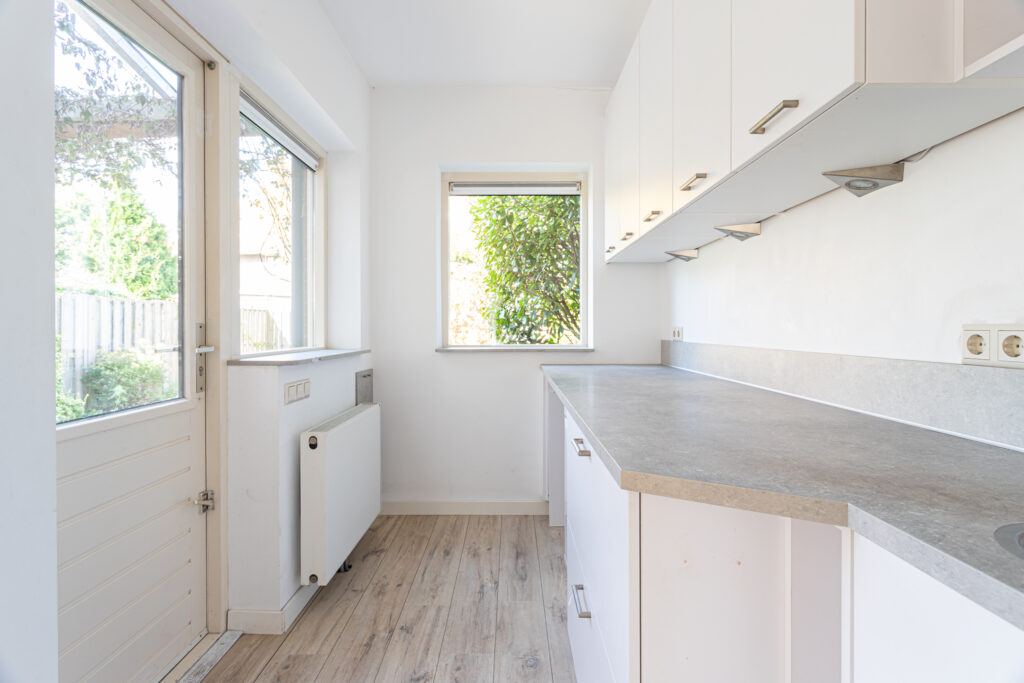 Bright modern kitchen with large windows