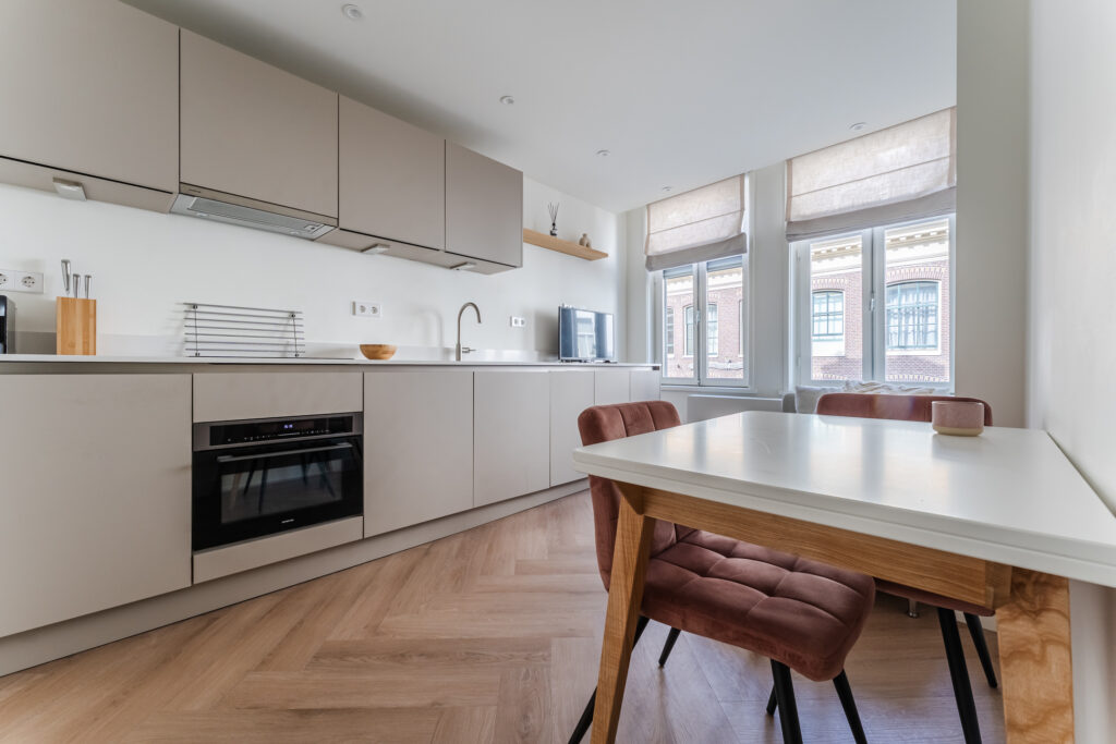 Modern kitchen with dining area and natural light