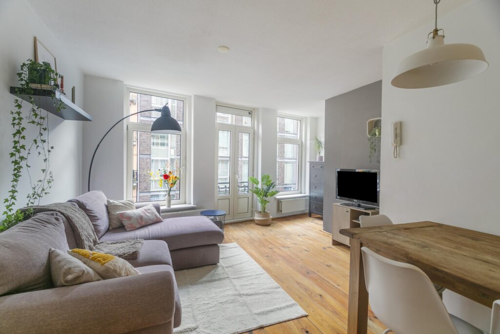 Bright living room with modern furniture and decor.