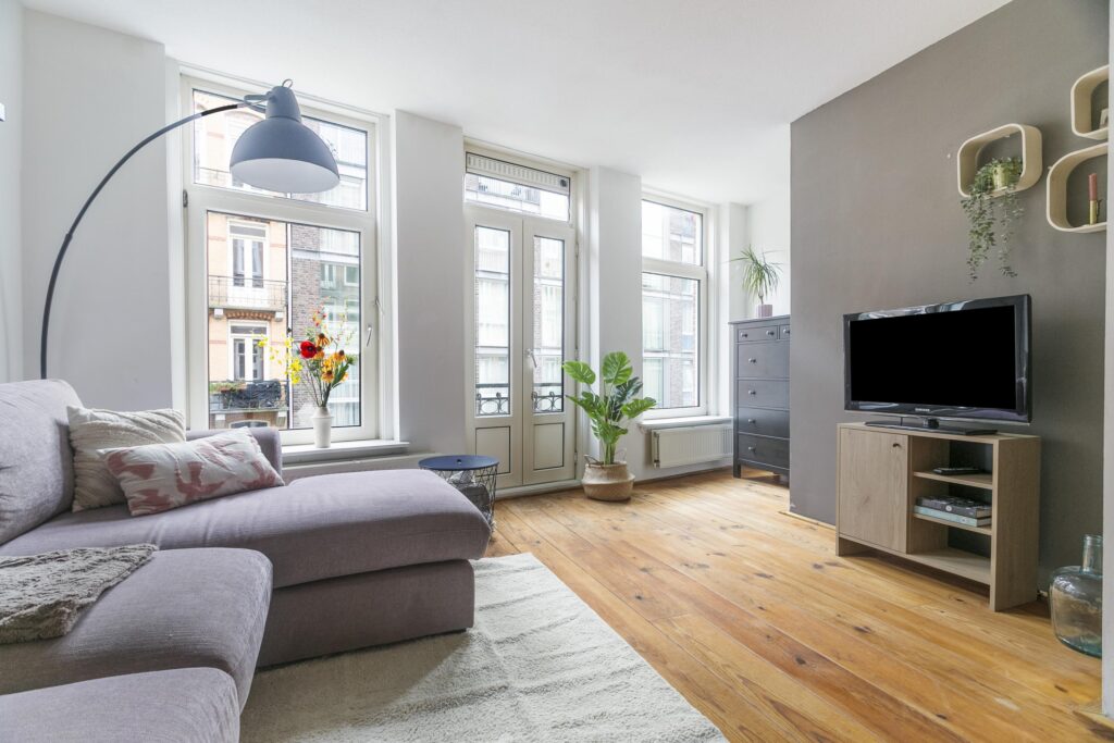 Bright living room with modern furniture and decor.