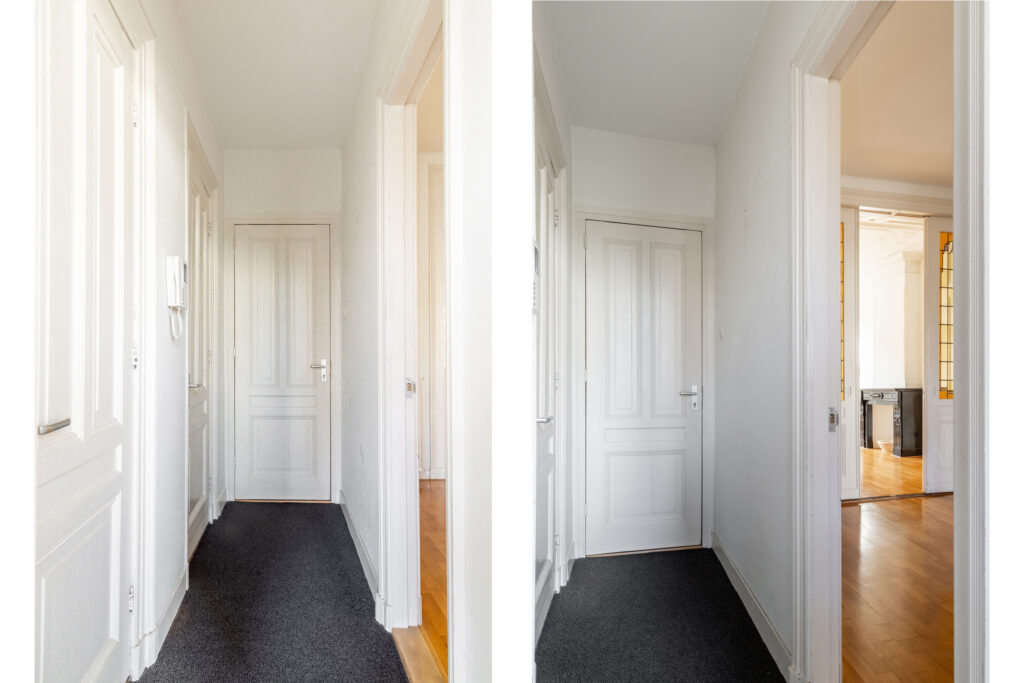 Bright hallway with white doors and hardwood floors