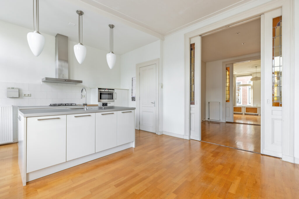 Modern kitchen with wooden floors.