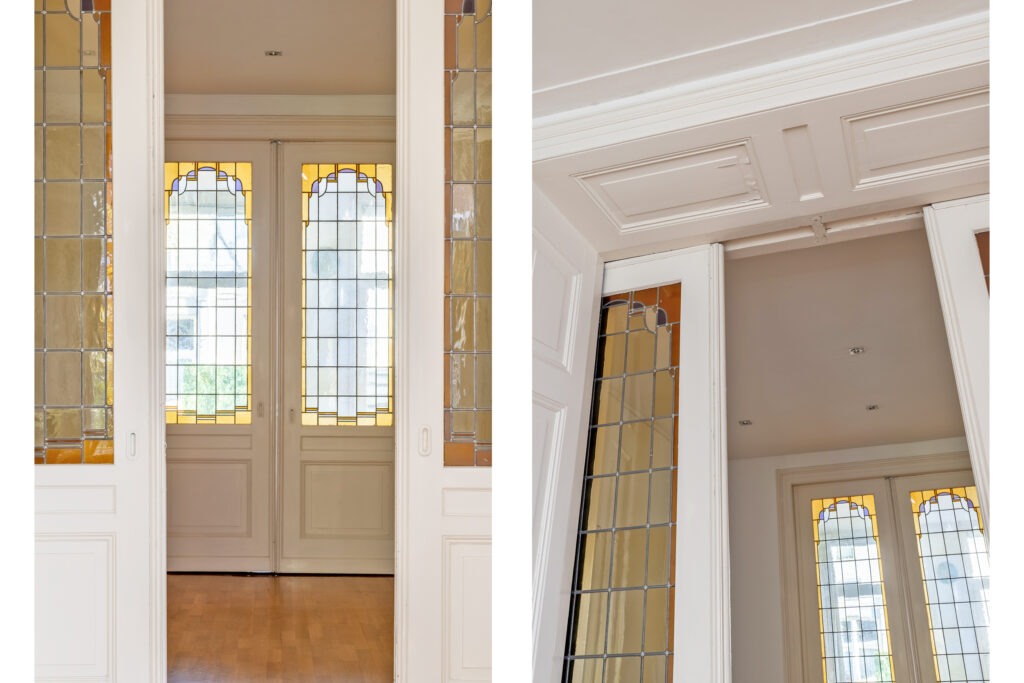 Elegant stained glass doors in hallway