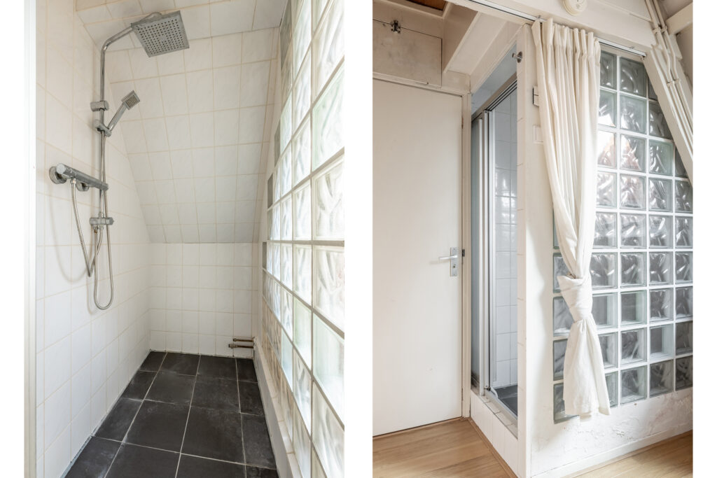 Modern shower and doorway with glass block wall.
