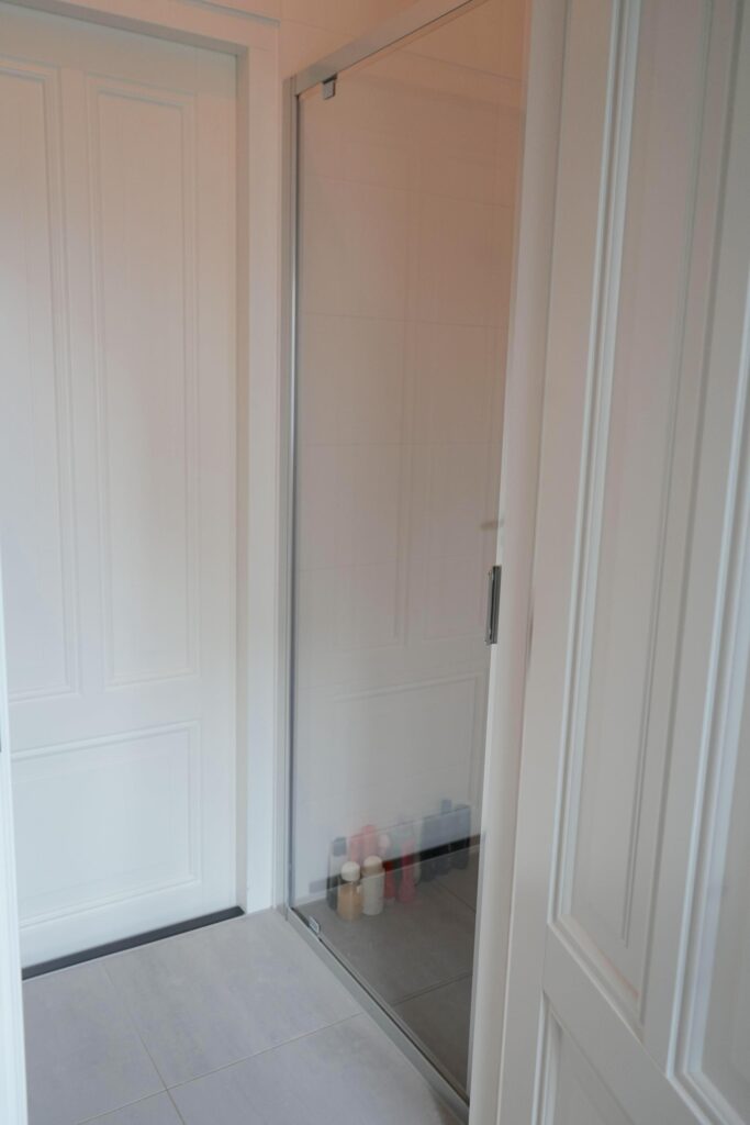 Modern bathroom with glass shower door