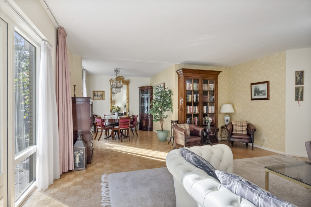 Elegant living room with vintage furniture and decor.