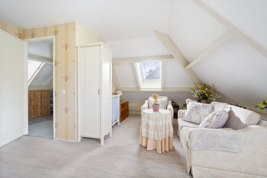 Cozy attic room with floral decor