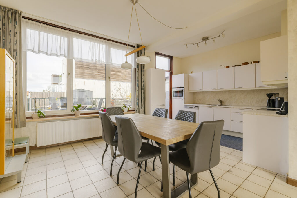 Modern kitchen with dining table and chairs