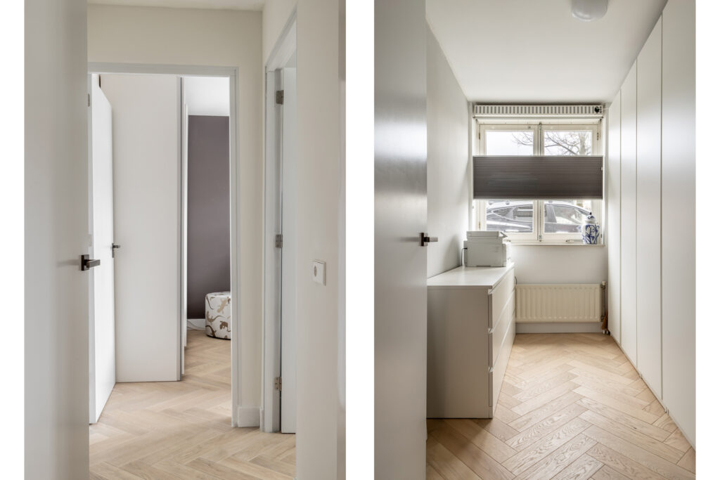 Narrow hallway with modern light wooden flooring.