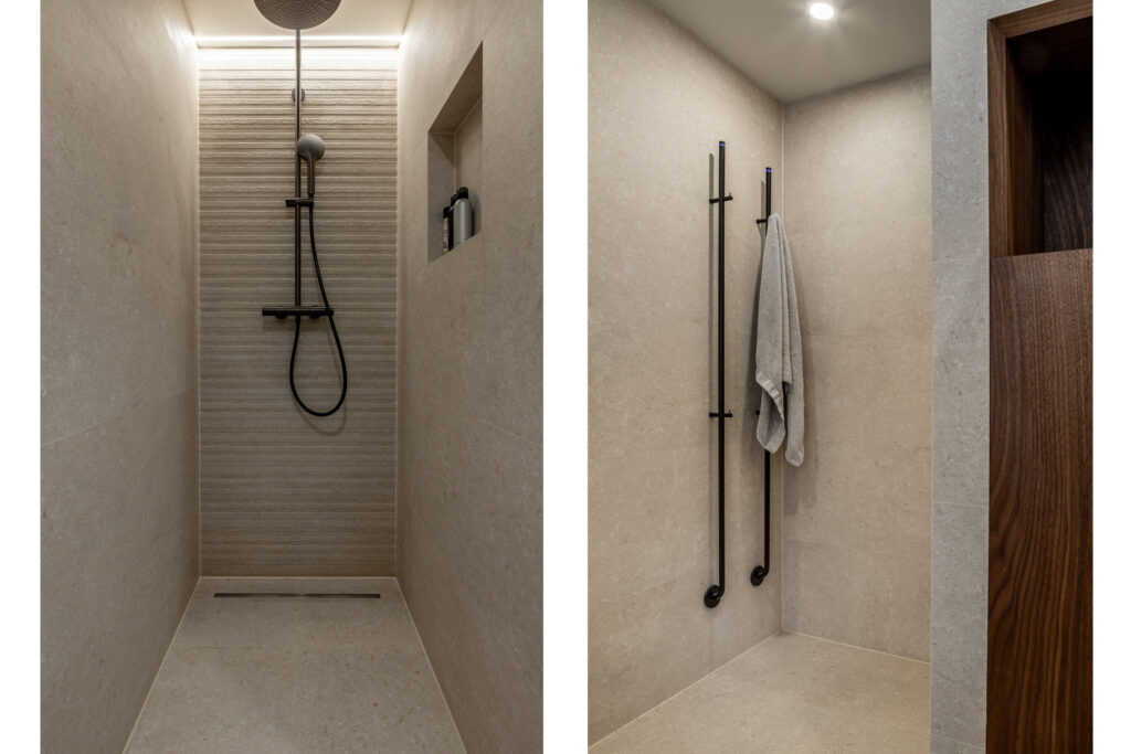 Modern minimalist shower with towel rack and niche shelves.