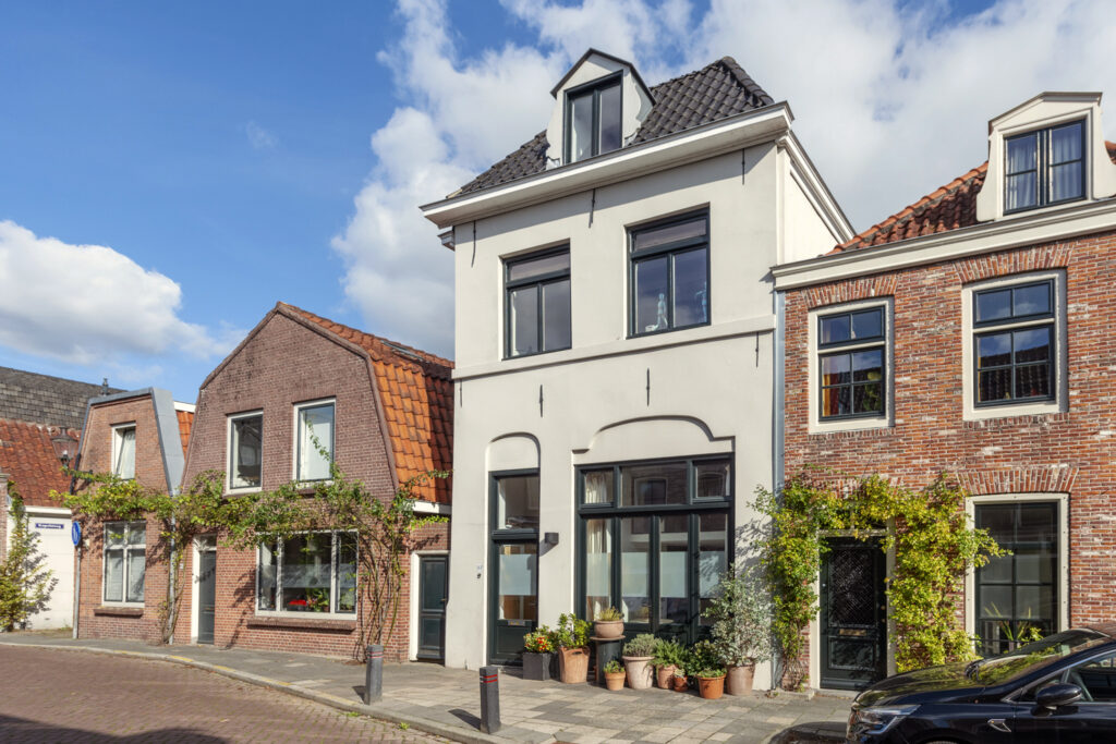 Quaint European street with colorful houses.
