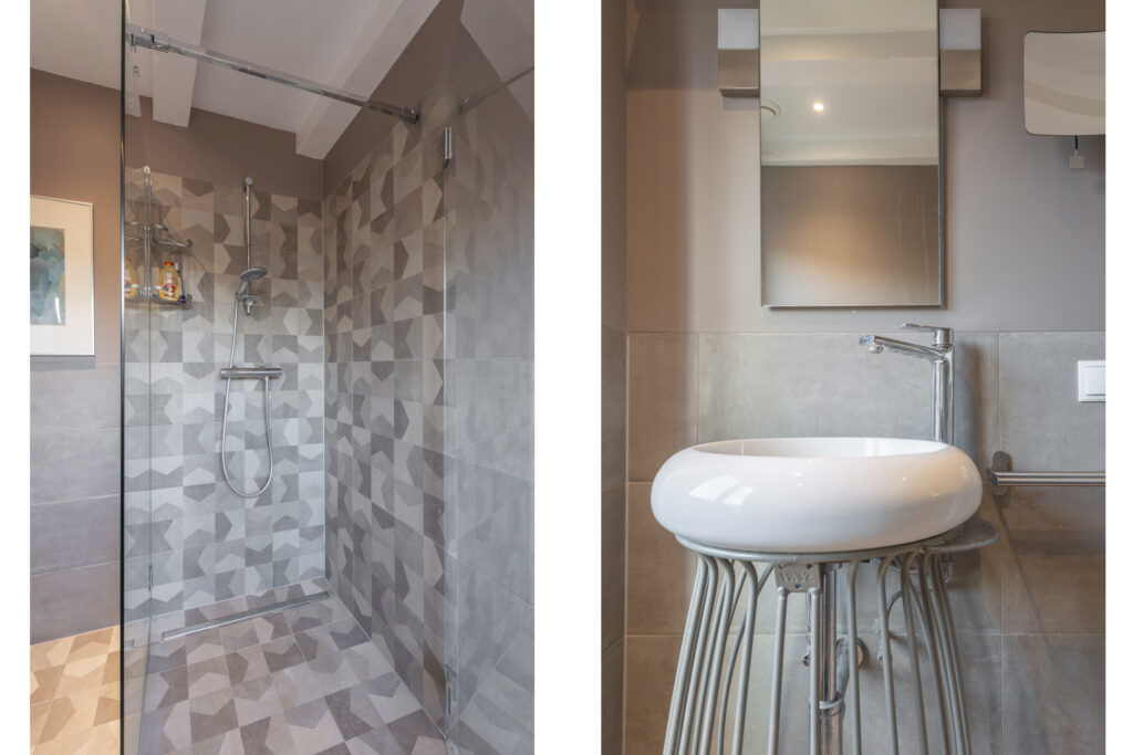 Modern bathroom with geometric tile shower area