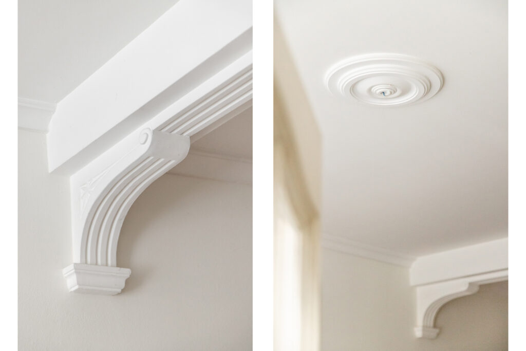 White architectural molding and ceiling medallion details