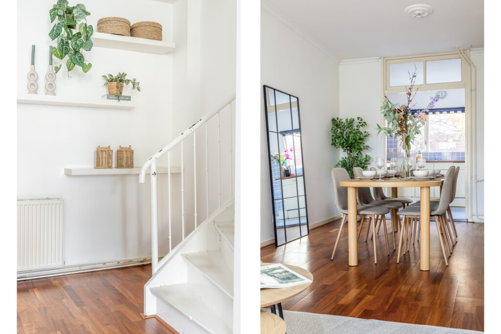 Modern dining room with plants and mirror.