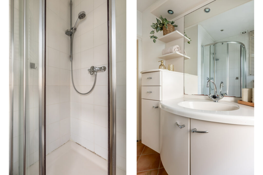 Modern bathroom with shower and sink.