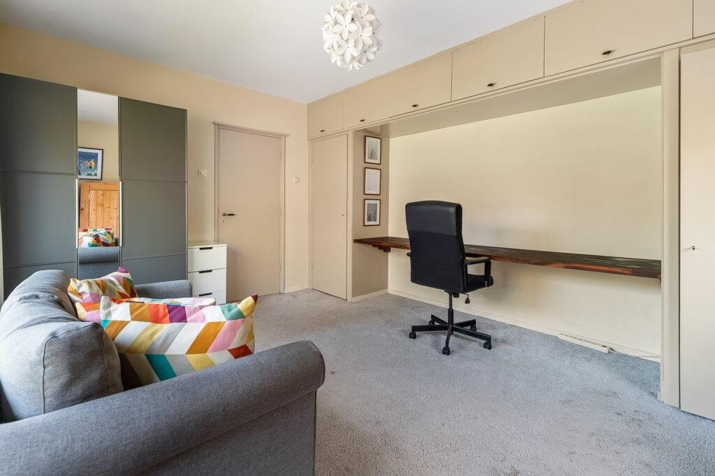 Cozy room with desk and colorful pillows