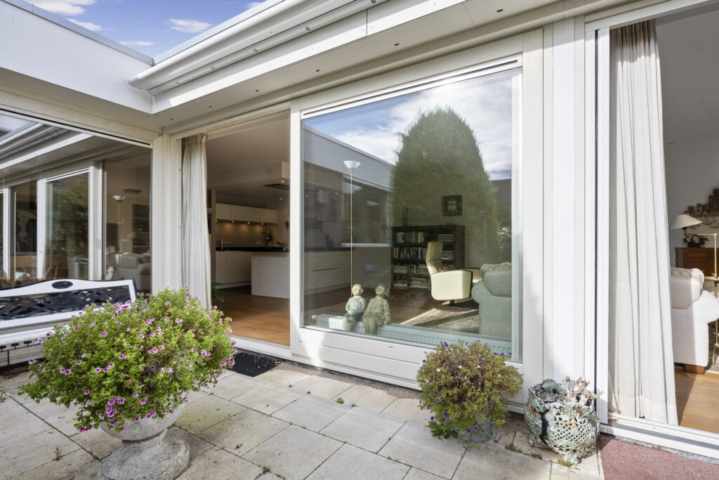 Modern patio with large sliding glass doors