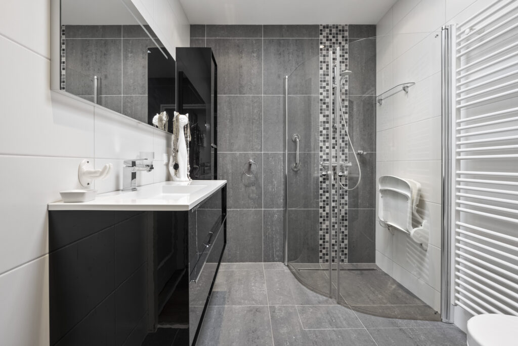 Modern bathroom with gray tiles and shower