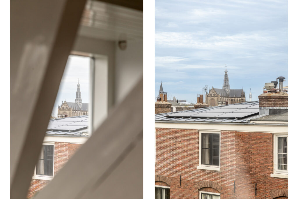 Cityscape with historic church and rooftops view.