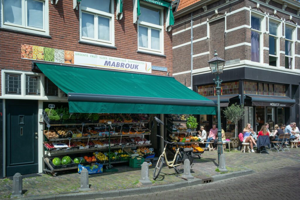 Street market stall with fresh fruits and vegetables.