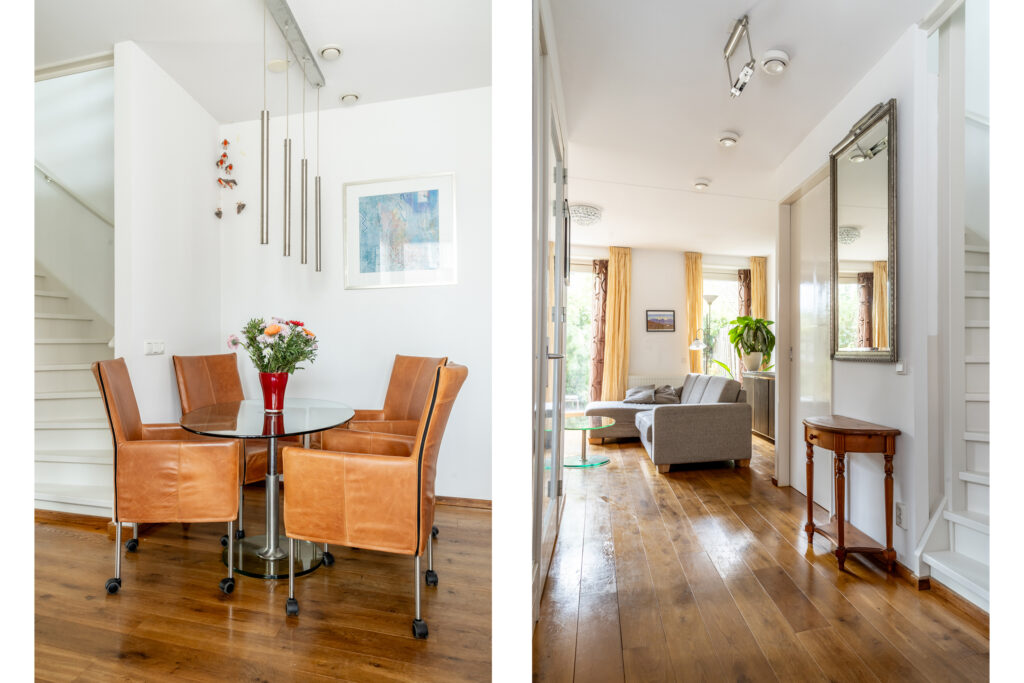 Modern living and dining room with wooden floors.