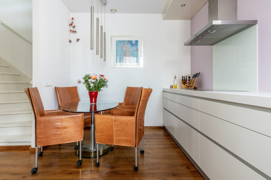 Modern kitchen with dining area and flowers