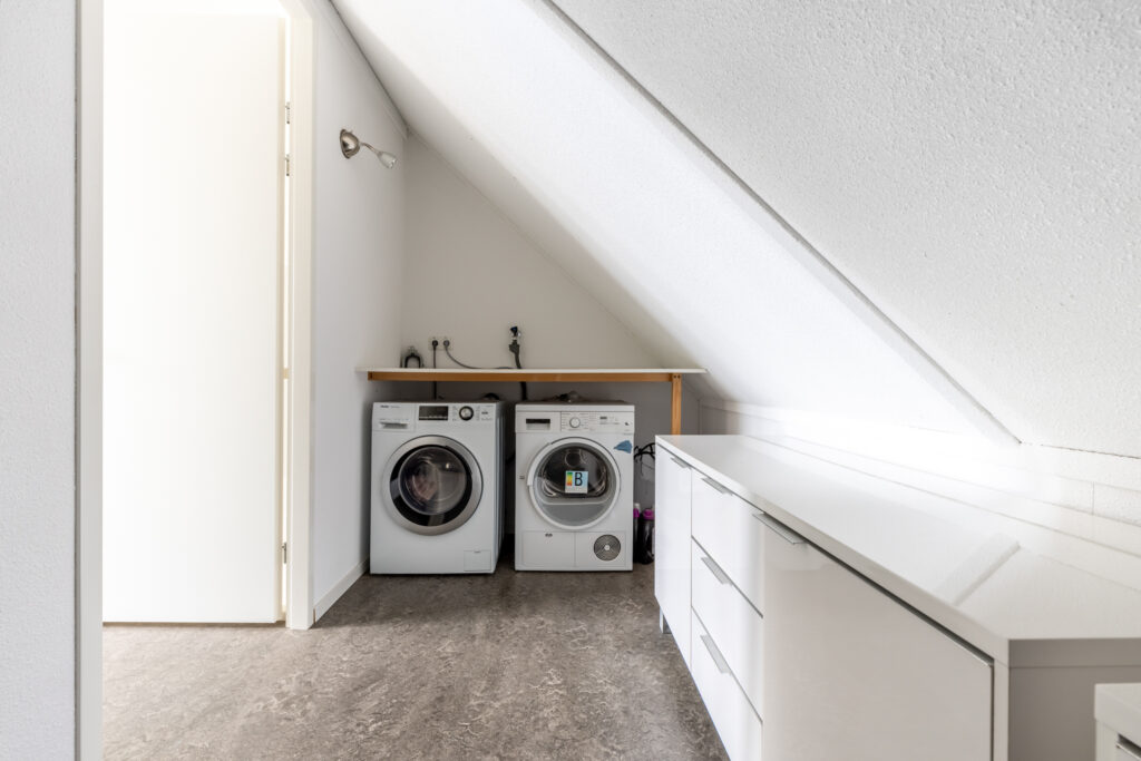 Modern laundry room with washer and dryer
