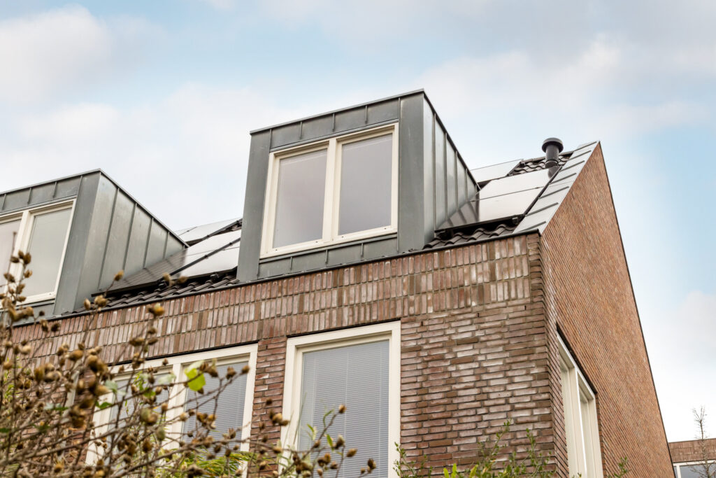Brick house with rooftop solar panels