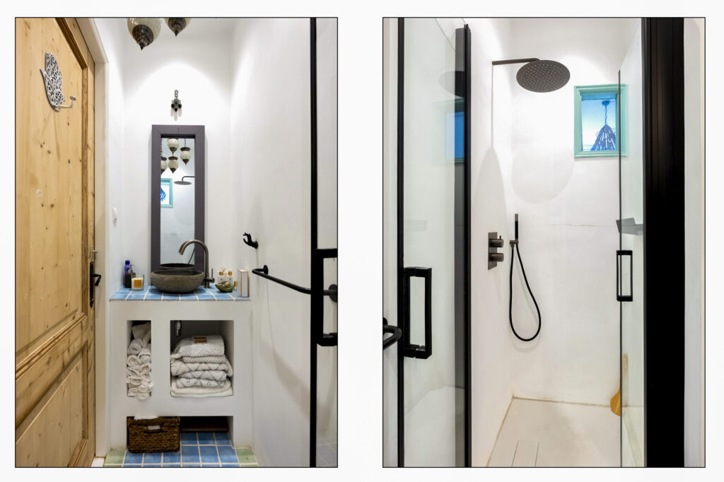 Modern bathroom with shower and rustic sink.