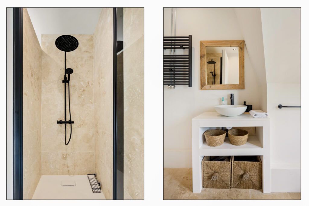 Modern bathroom with shower and sink area.