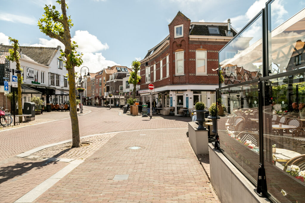 Picturesque European street with shops and outdoor seating