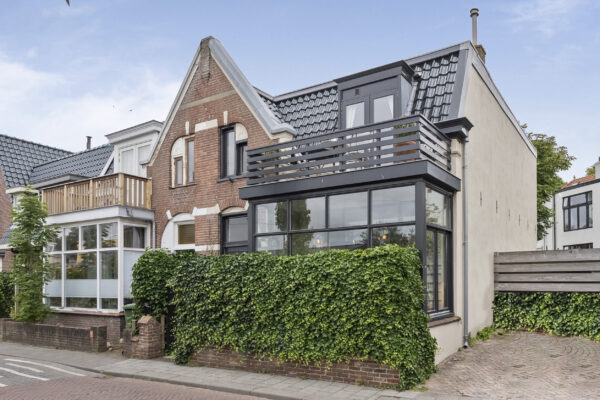 Modern brick house with greenery exterior.