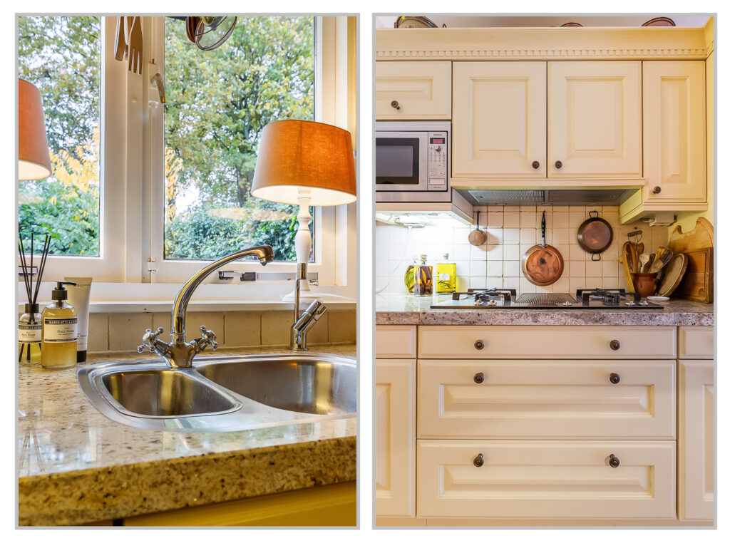 Cozy kitchen with sink, stove, and window view