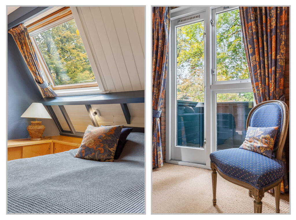 Cozy attic bedroom with window and chair view.
