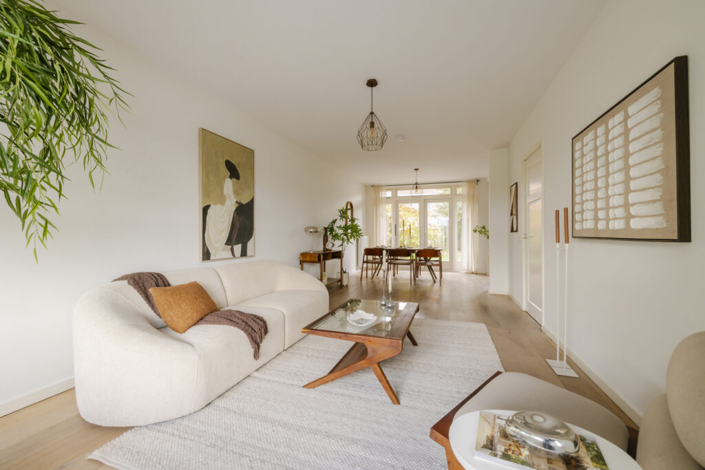 Modern living room with elegant decor and natural light.