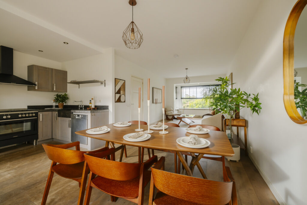 Modern dining room with wooden table and chairs