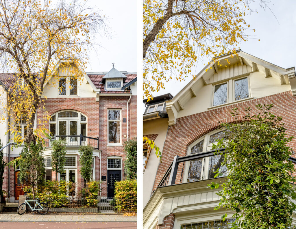 Brick house facade with autumn trees.