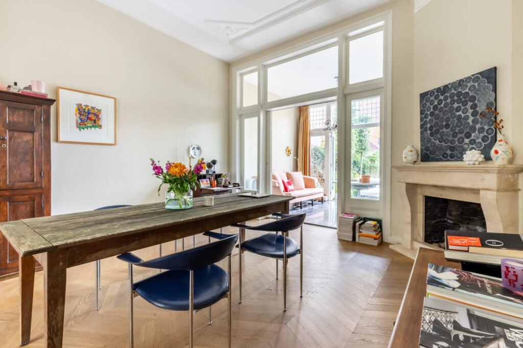 Cozy dining room with rustic table and chairs.