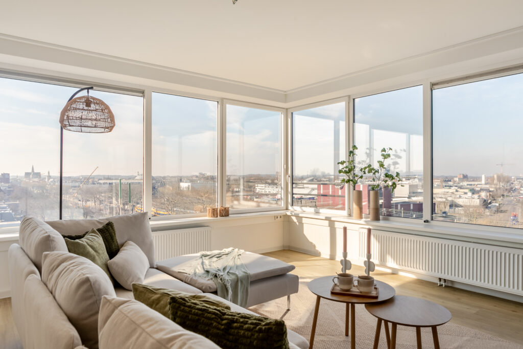 Bright living room with panoramic city view