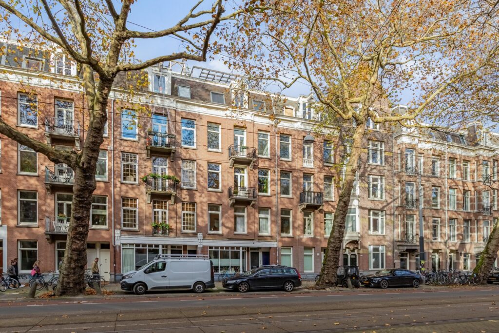 Historic Amsterdam apartment building in autumn