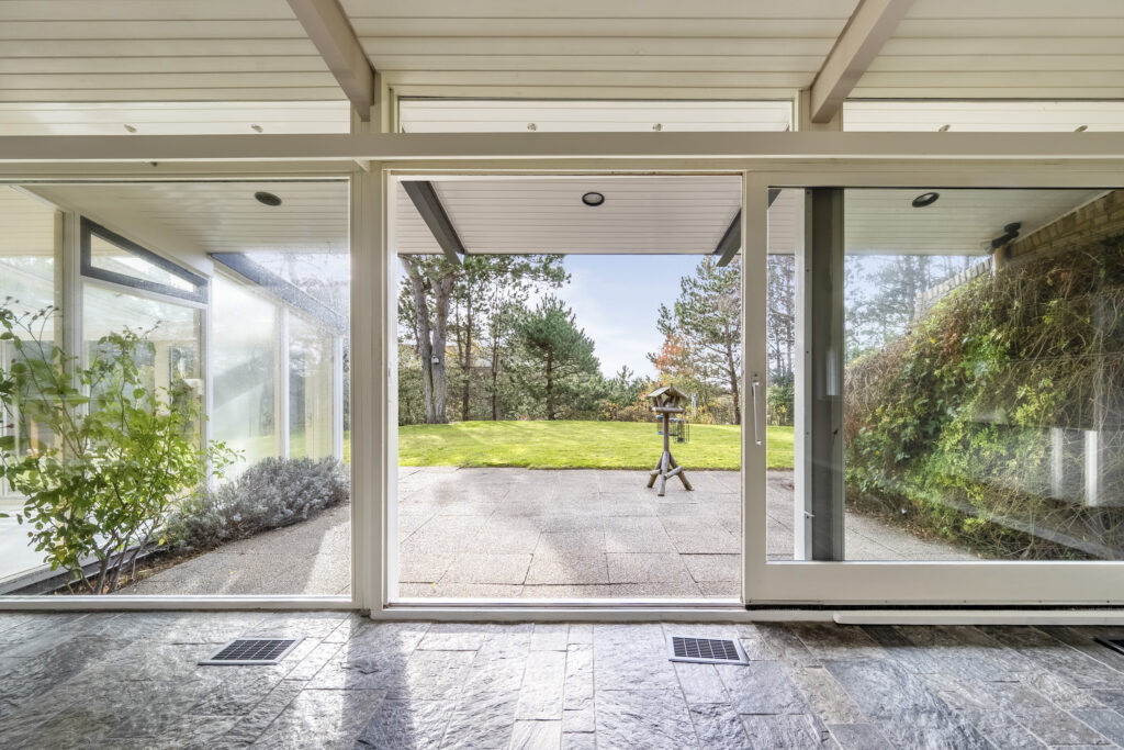 Open patio doors to garden view