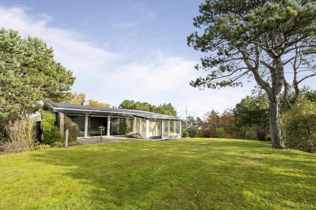 Modern house with spacious green lawn
