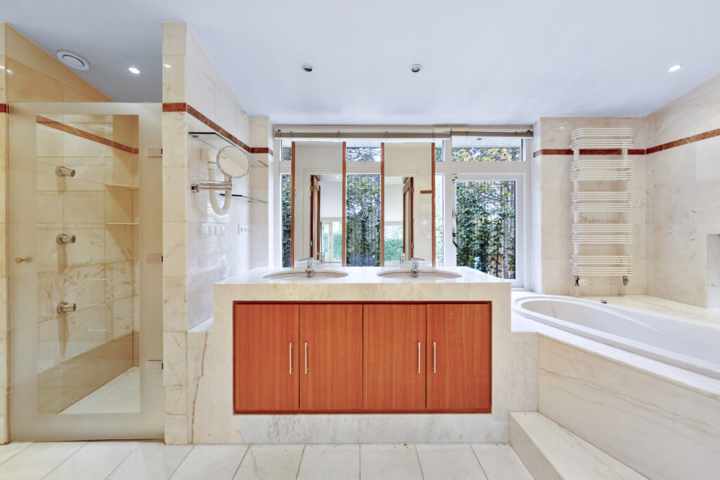 Modern bathroom with dual sinks and tub