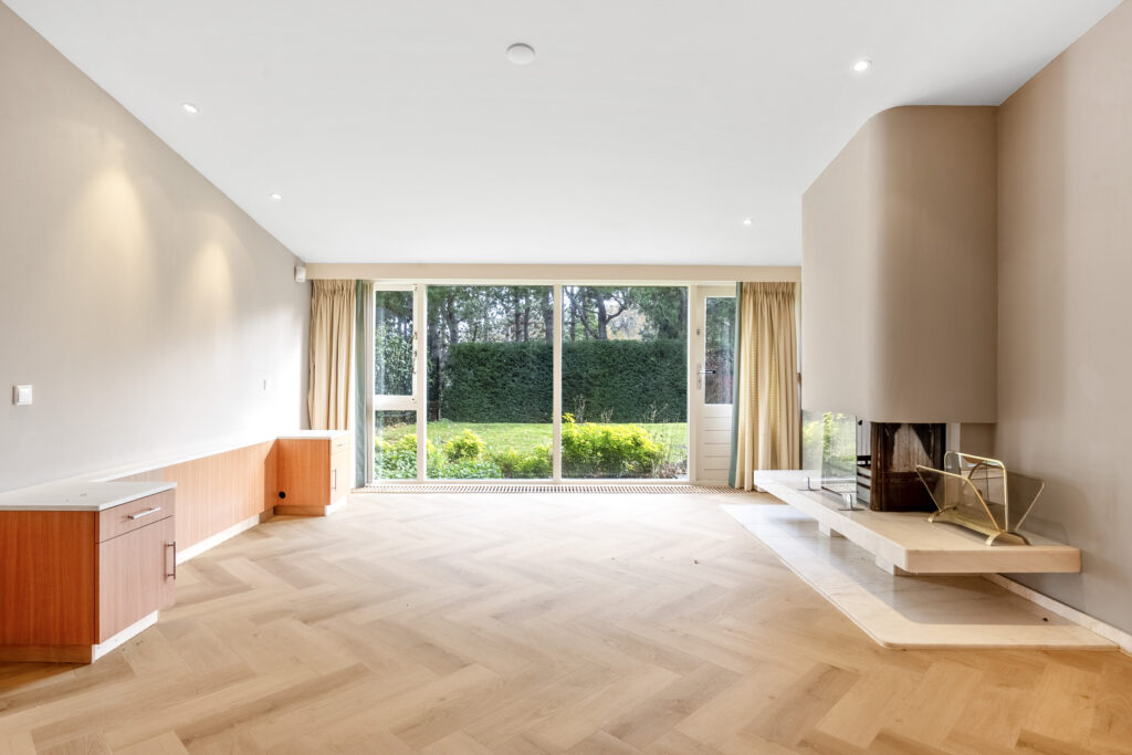 Spacious living room with large window view