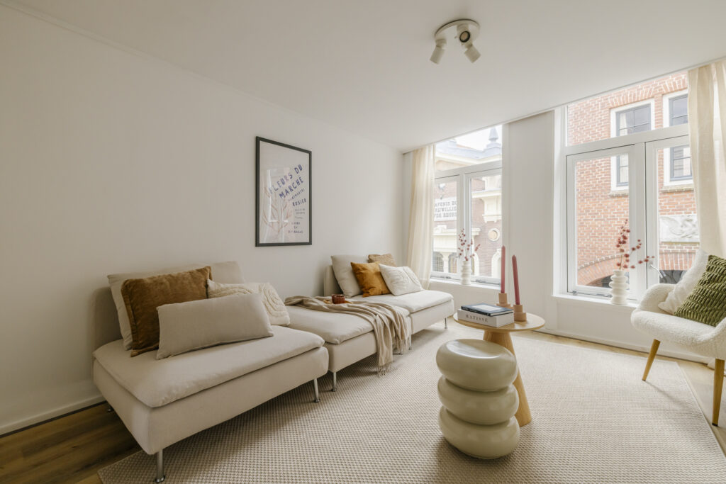 Cozy living room with modern decor and artwork.