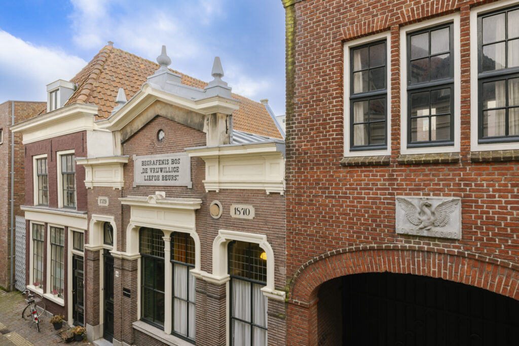 Historic brick building with Dutch architecture, 1870.
