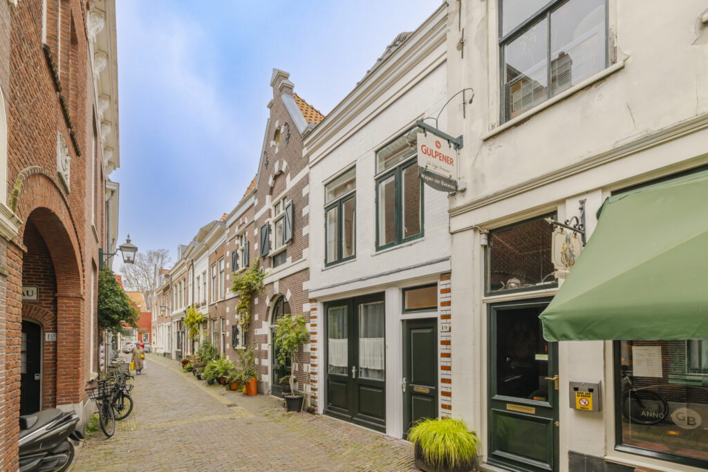 Charming narrow street with historic European architecture.