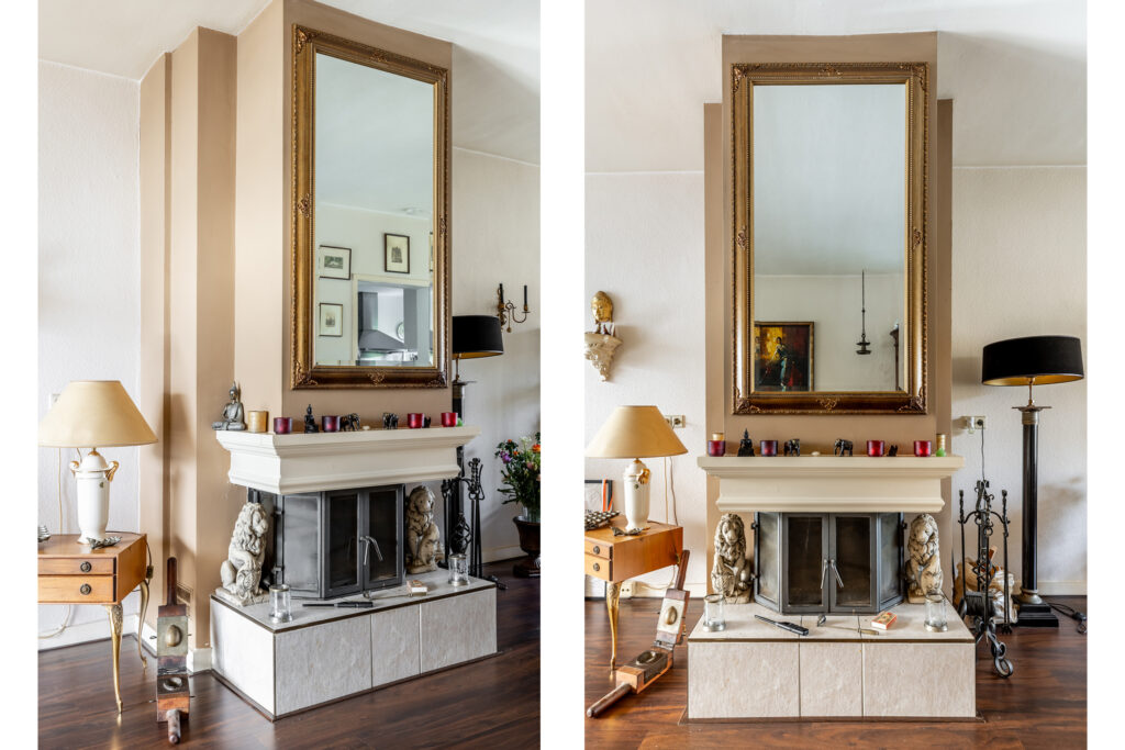 Elegant living room with decorated fireplace and mirror.