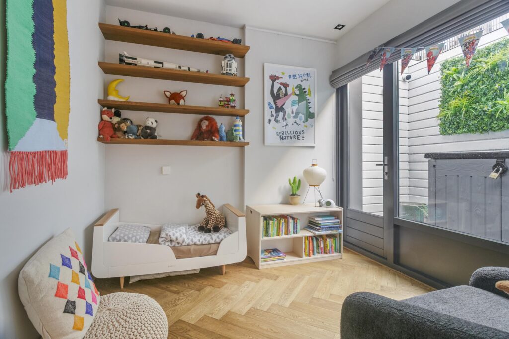 Cozy child's room with toys and books.